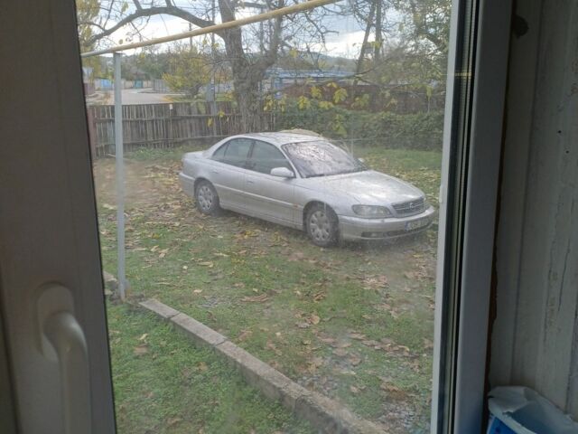 Серый Опель Омега, объемом двигателя 2 л и пробегом 1 тыс. км за 800 $, фото 1 на Automoto.ua