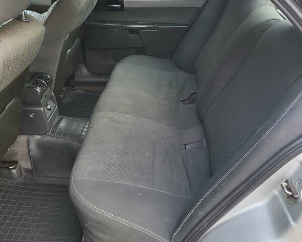 Серый Опель Омега, объемом двигателя 2.2 л и пробегом 300 тыс. км за 1900 $, фото 2 на Automoto.ua