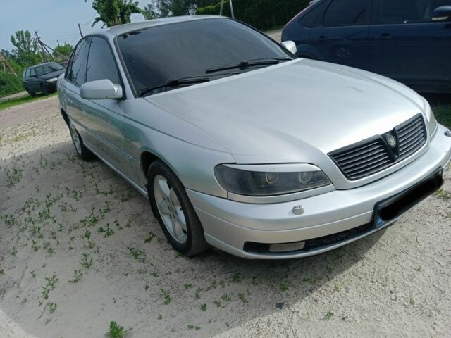 Серый Опель Омега, объемом двигателя 2.6 л и пробегом 224 тыс. км за 3000 $, фото 6 на Automoto.ua