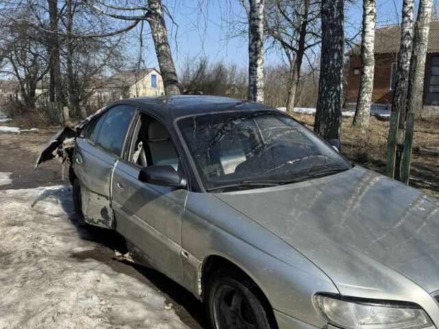 Серый Опель Омега, объемом двигателя 2.6 л и пробегом 260 тыс. км за 900 $, фото 1 на Automoto.ua