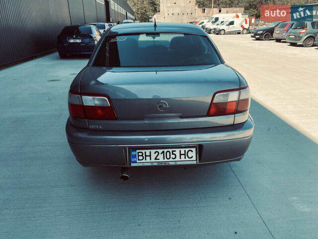 Серый Опель Омега, объемом двигателя 2.6 л и пробегом 368 тыс. км за 3600 $, фото 4 на Automoto.ua