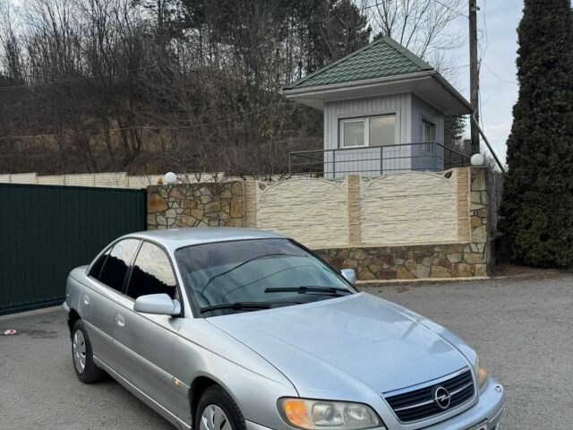 Серый Опель Омега, объемом двигателя 2.2 л и пробегом 223 тыс. км за 1400 $, фото 2 на Automoto.ua