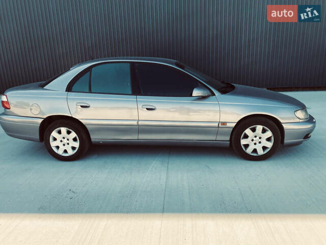 Серый Опель Омега, объемом двигателя 2.6 л и пробегом 368 тыс. км за 3600 $, фото 2 на Automoto.ua