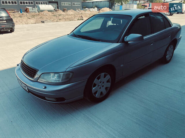 Серый Опель Омега, объемом двигателя 2.6 л и пробегом 368 тыс. км за 3600 $, фото 10 на Automoto.ua