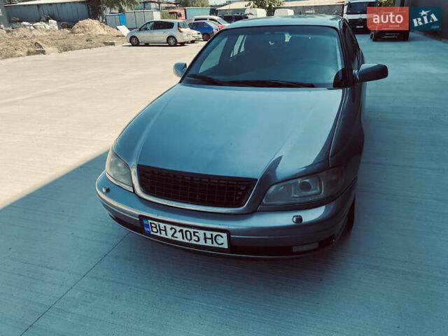 Серый Опель Омега, объемом двигателя 2.6 л и пробегом 368 тыс. км за 3600 $, фото 9 на Automoto.ua