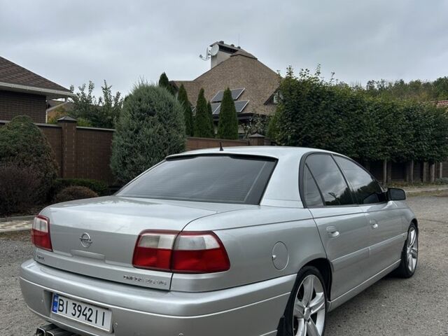 Серый Опель Омега, объемом двигателя 2.6 л и пробегом 340 тыс. км за 3750 $, фото 6 на Automoto.ua