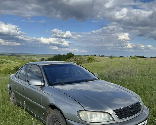 Серый Опель Омега, объемом двигателя 3.2 л и пробегом 350 тыс. км за 3000 $, фото 2 на Automoto.ua