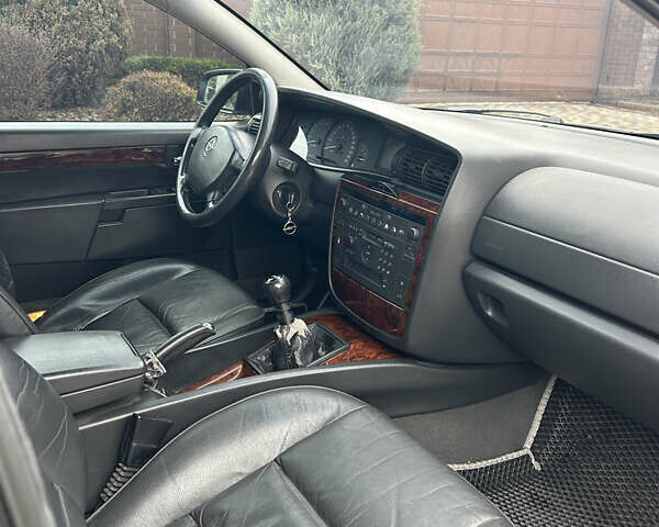 Серый Опель Омега, объемом двигателя 2.6 л и пробегом 340 тыс. км за 3750 $, фото 21 на Automoto.ua