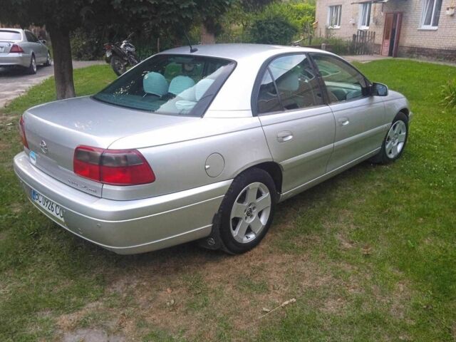 Серый Опель Омега, объемом двигателя 2.5 л и пробегом 263 тыс. км за 4000 $, фото 1 на Automoto.ua