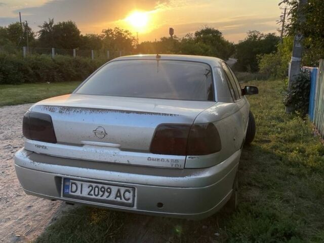 Серый Опель Омега, объемом двигателя 2.9 л и пробегом 400 тыс. км за 6000 $, фото 4 на Automoto.ua