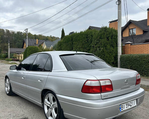 Серый Опель Омега, объемом двигателя 2.6 л и пробегом 340 тыс. км за 3750 $, фото 8 на Automoto.ua