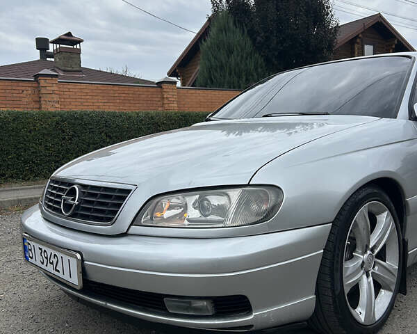 Серый Опель Омега, объемом двигателя 2.6 л и пробегом 340 тыс. км за 3750 $, фото 1 на Automoto.ua