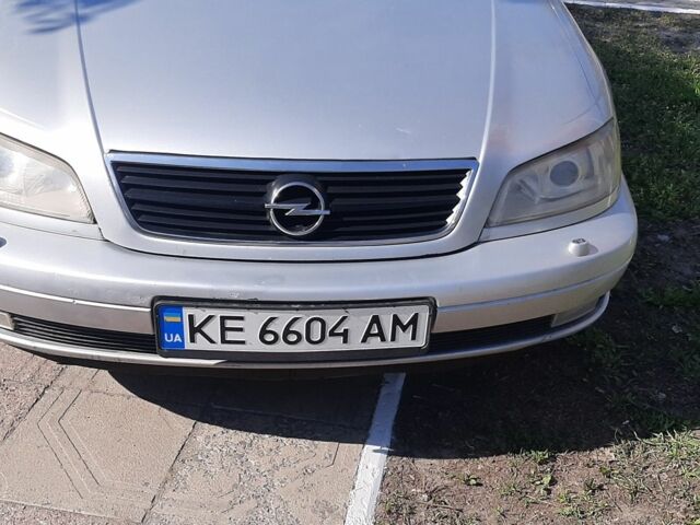 Серый Опель Омега, объемом двигателя 2.2 л и пробегом 260 тыс. км за 4200 $, фото 2 на Automoto.ua