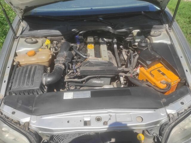 Серый Опель Омега, объемом двигателя 2.2 л и пробегом 356 тыс. км за 3500 $, фото 8 на Automoto.ua