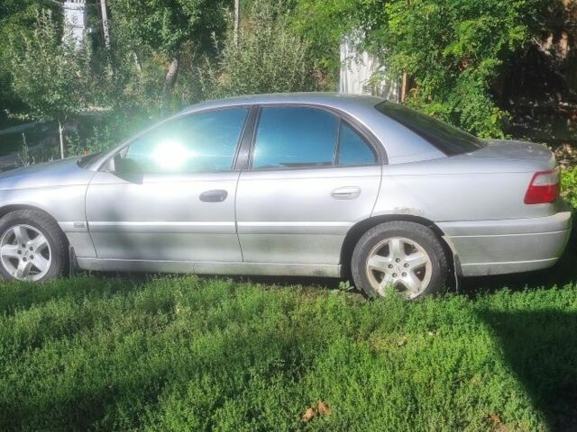 Серый Опель Омега, объемом двигателя 2.2 л и пробегом 356 тыс. км за 3500 $, фото 1 на Automoto.ua