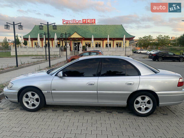 Серый Опель Омега, объемом двигателя 2.6 л и пробегом 300 тыс. км за 5000 $, фото 8 на Automoto.ua