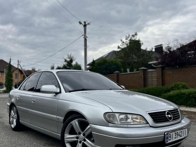 Серый Опель Омега, объемом двигателя 2.6 л и пробегом 340 тыс. км за 3750 $, фото 3 на Automoto.ua