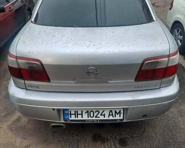 Серый Опель Омега, объемом двигателя 2.2 л и пробегом 320 тыс. км за 1800 $, фото 1 на Automoto.ua