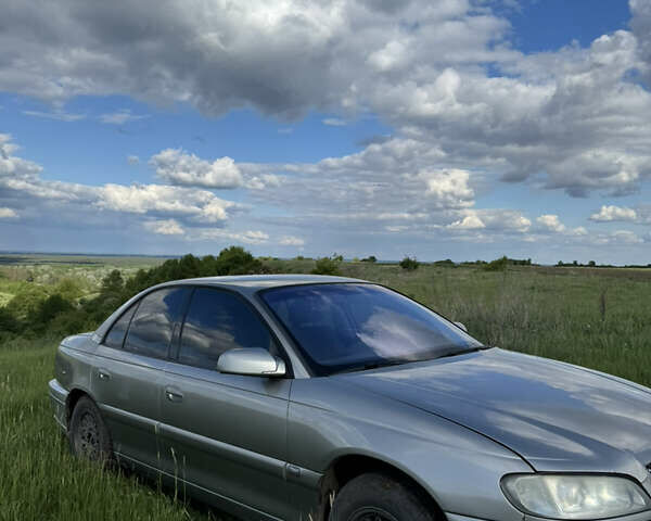 Серый Опель Омега, объемом двигателя 3.2 л и пробегом 350 тыс. км за 3000 $, фото 3 на Automoto.ua