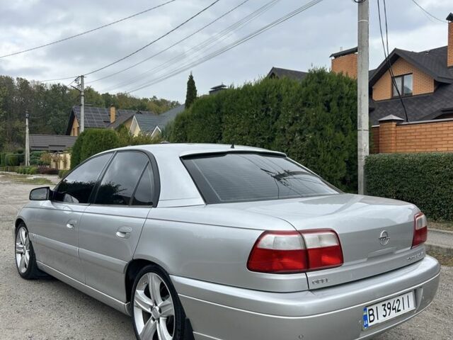 Серый Опель Омега, объемом двигателя 2.6 л и пробегом 340 тыс. км за 3750 $, фото 4 на Automoto.ua