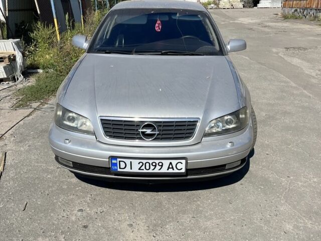 Серый Опель Омега, объемом двигателя 2.9 л и пробегом 400 тыс. км за 6000 $, фото 2 на Automoto.ua