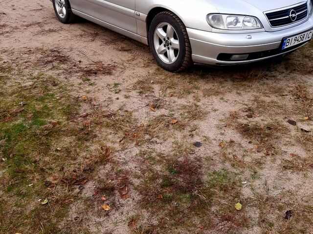 Серый Опель Омега, объемом двигателя 2.2 л и пробегом 400 тыс. км за 2500 $, фото 1 на Automoto.ua