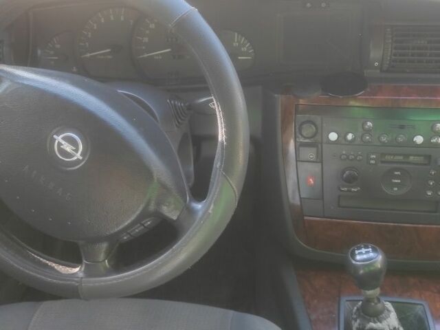 Серый Опель Омега, объемом двигателя 2.2 л и пробегом 356 тыс. км за 3500 $, фото 3 на Automoto.ua