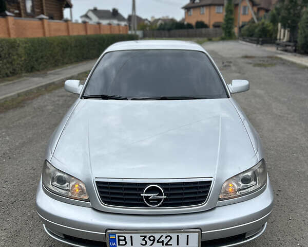 Серый Опель Омега, объемом двигателя 2.6 л и пробегом 340 тыс. км за 3750 $, фото 5 на Automoto.ua