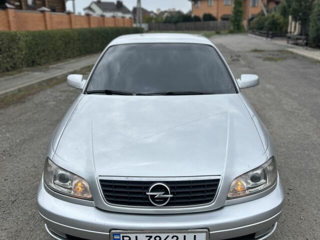 Серый Опель Омега, объемом двигателя 2.6 л и пробегом 340 тыс. км за 3750 $, фото 2 на Automoto.ua