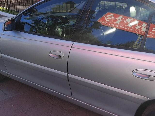 Серый Опель Омега, объемом двигателя 2.2 л и пробегом 260 тыс. км за 4200 $, фото 3 на Automoto.ua