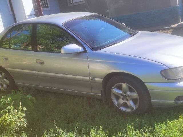 Серый Опель Омега, объемом двигателя 2.2 л и пробегом 356 тыс. км за 3500 $, фото 5 на Automoto.ua