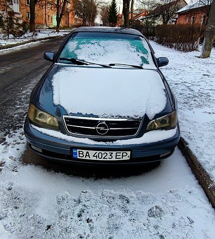 Серый Опель Омега, объемом двигателя 2.2 л и пробегом 415 тыс. км за 3000 $, фото 9 на Automoto.ua