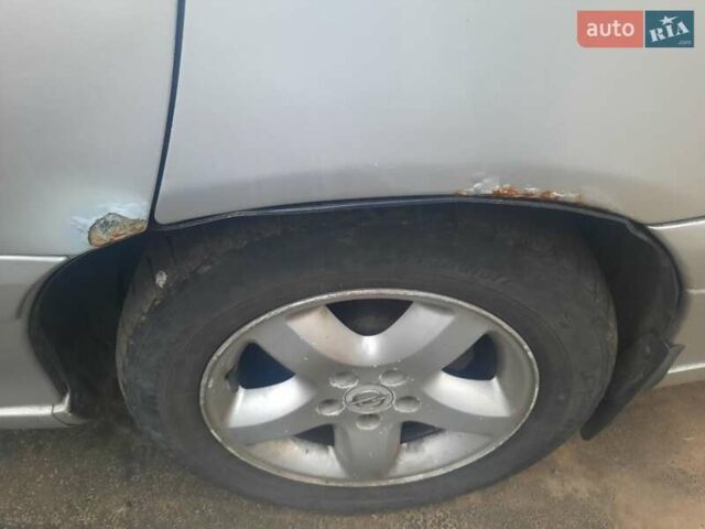 Серый Опель Омега, объемом двигателя 2.2 л и пробегом 320 тыс. км за 1800 $, фото 3 на Automoto.ua