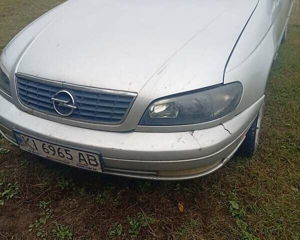 Серый Опель Омега, объемом двигателя 2.2 л и пробегом 331 тыс. км за 1900 $, фото 3 на Automoto.ua