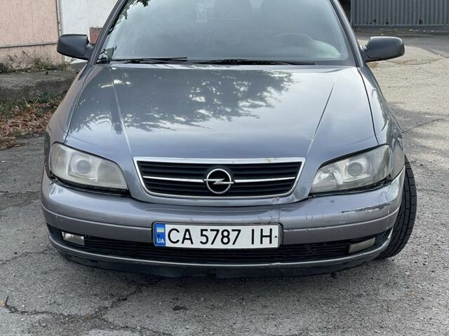 Сірий Опель Омега, об'ємом двигуна 2.2 л та пробігом 250 тис. км за 1901 $, фото 13 на Automoto.ua