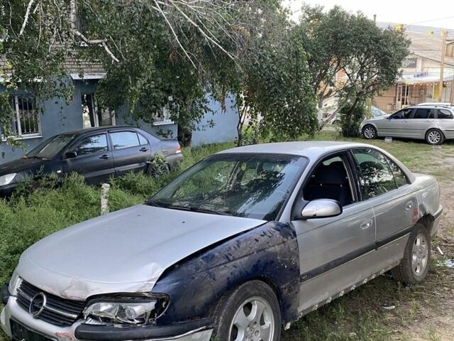 Сірий Опель Омега, об'ємом двигуна 2 л та пробігом 174 тис. км за 700 $, фото 3 на Automoto.ua