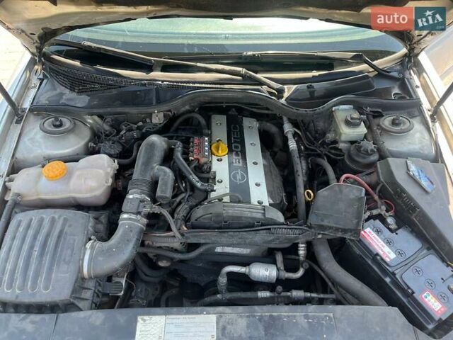 Сірий Опель Омега, об'ємом двигуна 2.2 л та пробігом 340 тис. км за 2600 $, фото 10 на Automoto.ua