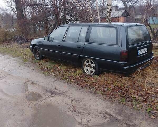 Серый Опель Омега, объемом двигателя 1.8 л и пробегом 217 тыс. км за 350 $, фото 2 на Automoto.ua