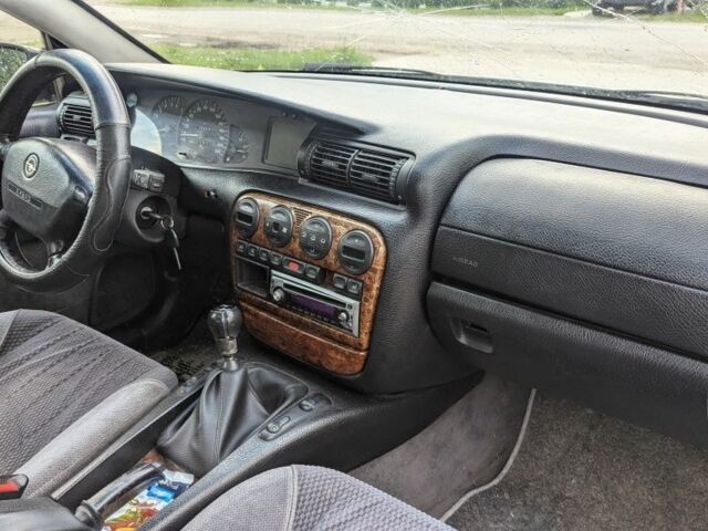 Сірий Опель Омега, об'ємом двигуна 2 л та пробігом 300 тис. км за 1650 $, фото 5 на Automoto.ua