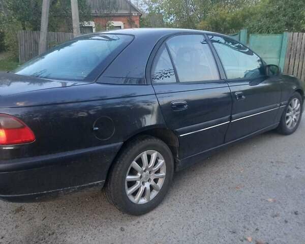 Сірий Опель Омега, об'ємом двигуна 2 л та пробігом 360 тис. км за 2300 $, фото 7 на Automoto.ua