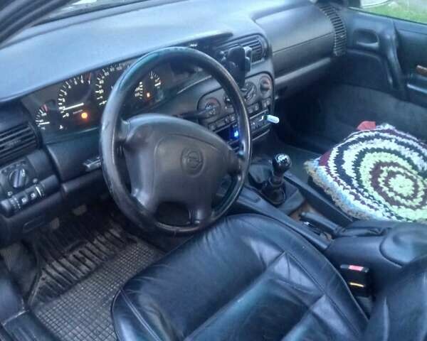 Сірий Опель Омега, об'ємом двигуна 2 л та пробігом 360 тис. км за 2300 $, фото 2 на Automoto.ua