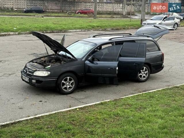 Сірий Опель Омега, об'ємом двигуна 2 л та пробігом 247 тис. км за 2200 $, фото 14 на Automoto.ua