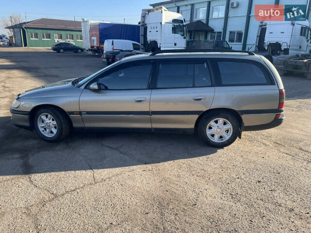 Серый Опель Омега, объемом двигателя 2.5 л и пробегом 299 тыс. км за 2500 $, фото 2 на Automoto.ua