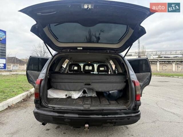 Сірий Опель Омега, об'ємом двигуна 2 л та пробігом 247 тис. км за 2200 $, фото 19 на Automoto.ua