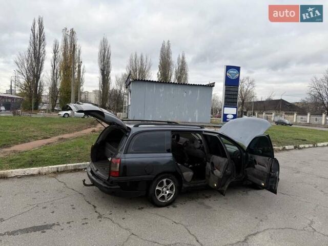 Сірий Опель Омега, об'ємом двигуна 2 л та пробігом 247 тис. км за 2200 $, фото 10 на Automoto.ua