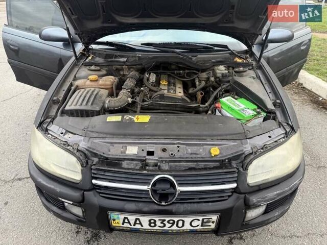 Сірий Опель Омега, об'ємом двигуна 2 л та пробігом 247 тис. км за 2200 $, фото 18 на Automoto.ua