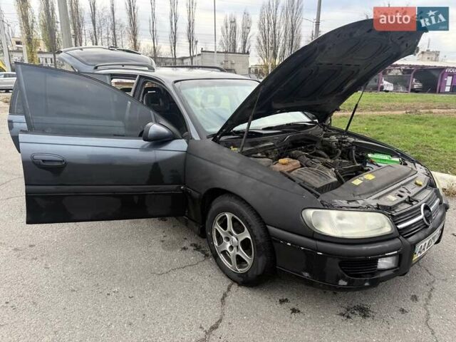 Сірий Опель Омега, об'ємом двигуна 2 л та пробігом 247 тис. км за 2200 $, фото 11 на Automoto.ua