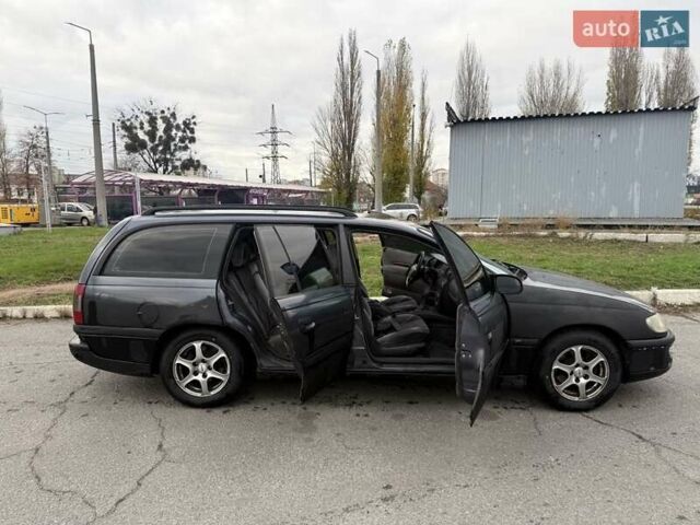 Сірий Опель Омега, об'ємом двигуна 2 л та пробігом 247 тис. км за 2200 $, фото 24 на Automoto.ua