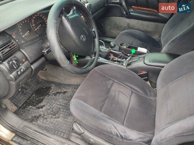 Серый Опель Омега, объемом двигателя 2 л и пробегом 360 тыс. км за 2300 $, фото 10 на Automoto.ua