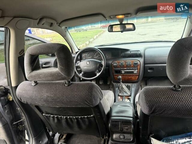 Сірий Опель Омега, об'ємом двигуна 2 л та пробігом 247 тис. км за 2200 $, фото 21 на Automoto.ua